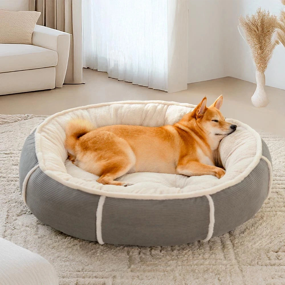 Cama para perros en forma de donut de corduroy ultra suave y antien ansiedad