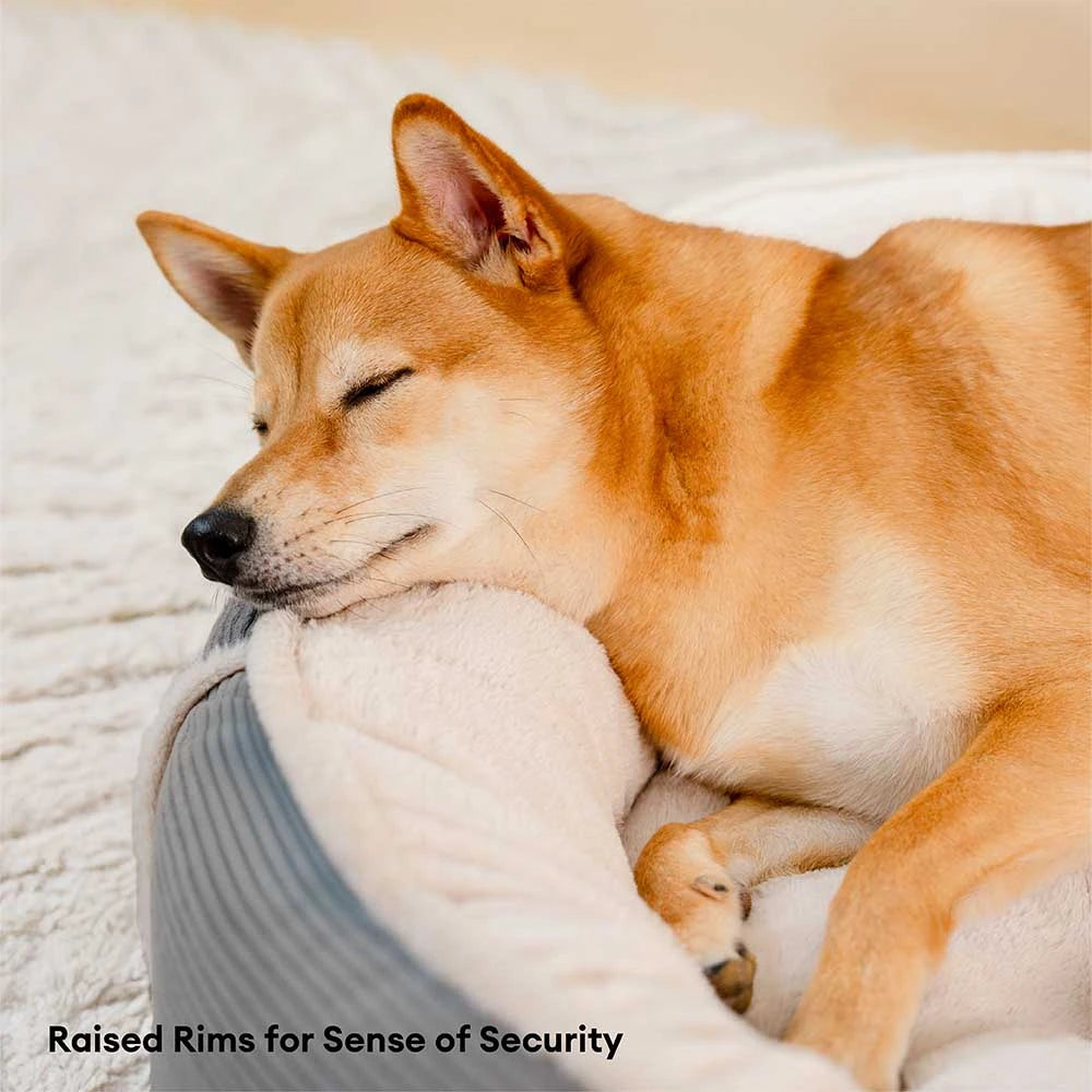 Cama para perros en forma de donut de corduroy ultra suave y antien ansiedad