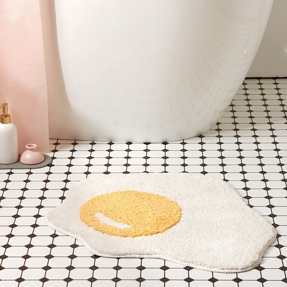 Alfombra de baño de huevo frito