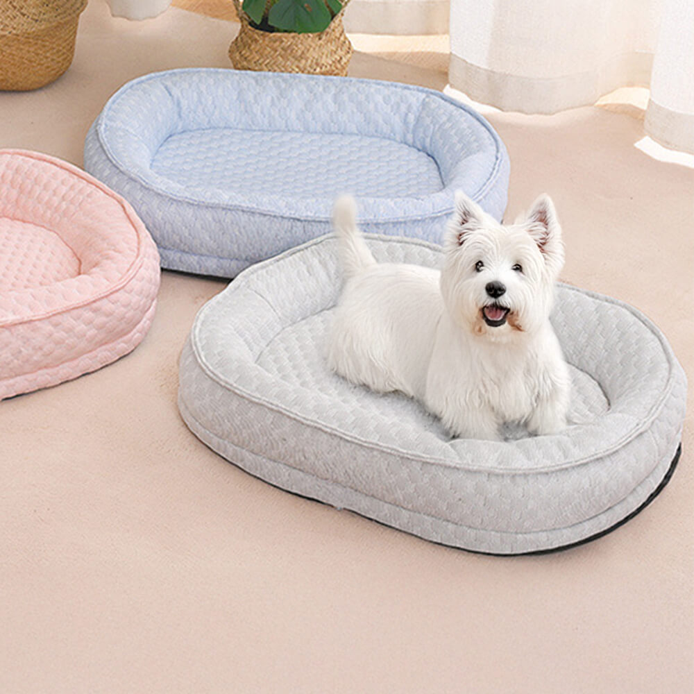Cama para perro ovalada en forma de donut con comodidad refrescante elevada