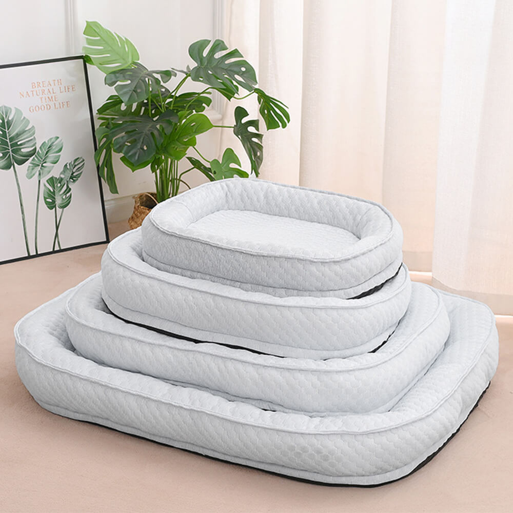 Cama para perro ovalada en forma de donut con comodidad refrescante elevada