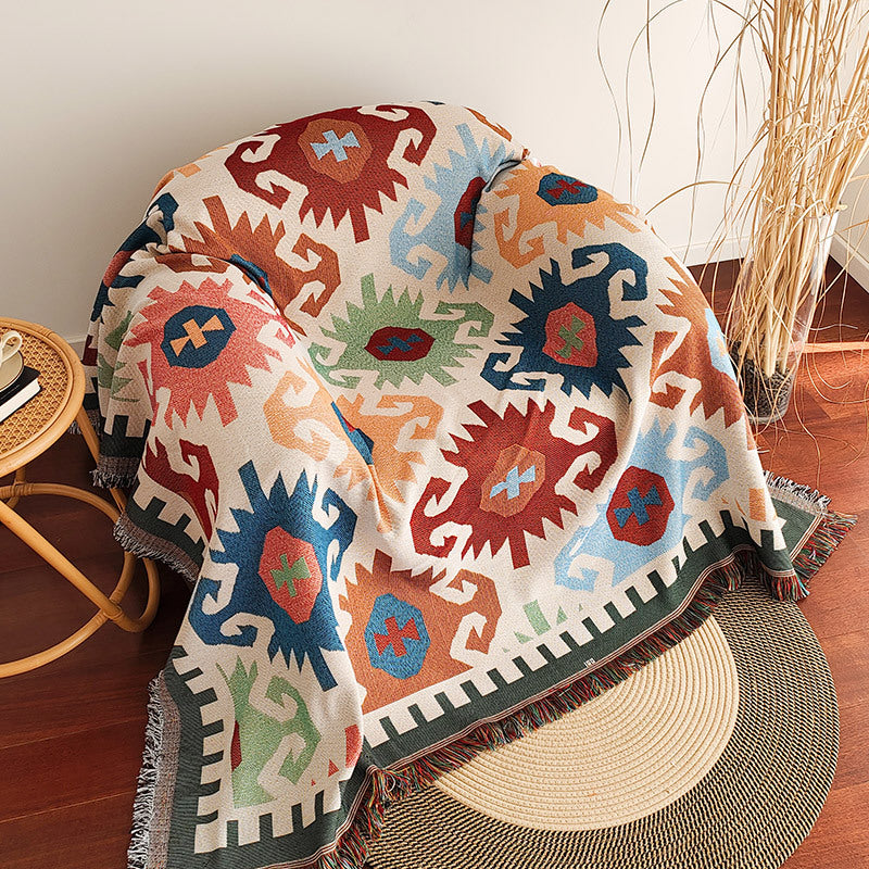 <tc>Color</tc> Manta para sofá con ribete de flecos y diseño de cuadros en bloque