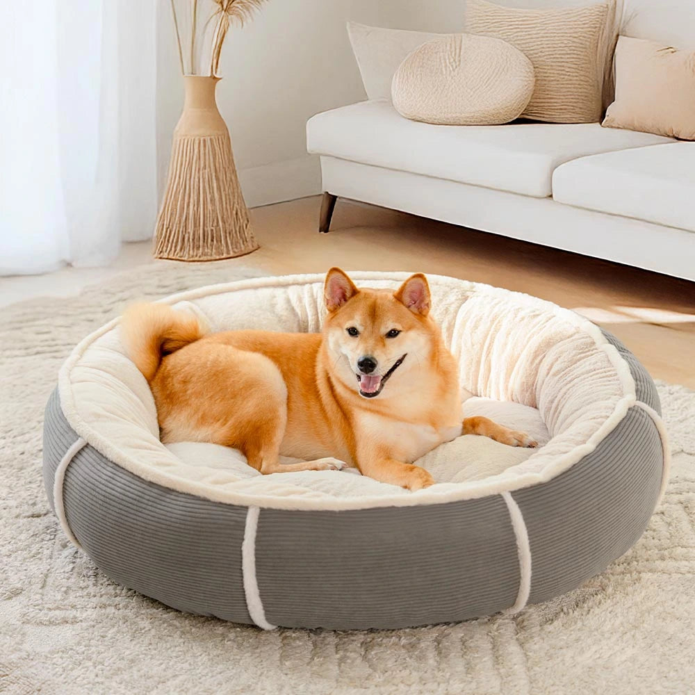 Cama para perros en forma de donut de corduroy ultra suave y antien ansiedad