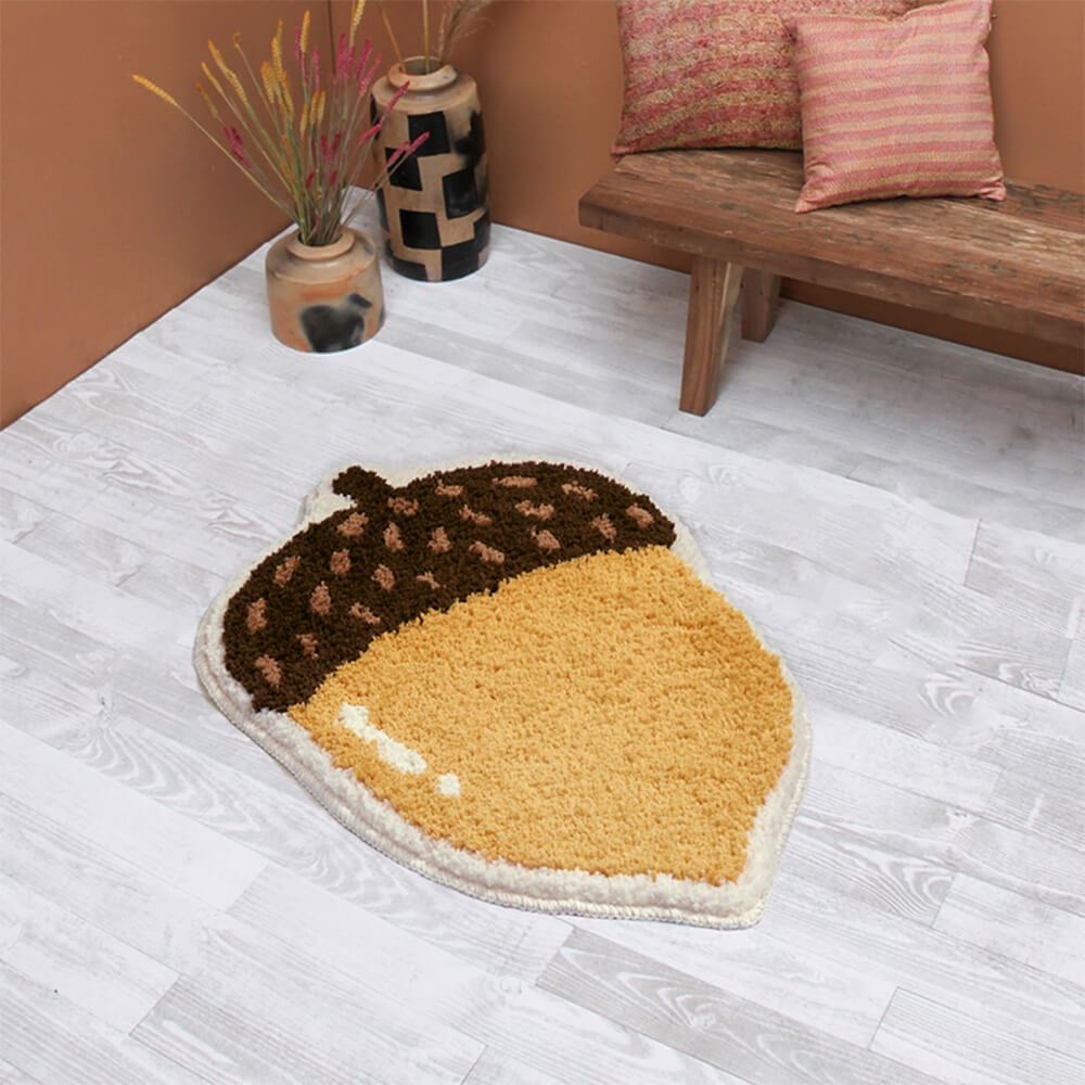 Alfombra decorativa multifuncional antideslizante de color castaño con forma de piña