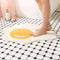Alfombra de baño de huevo frito