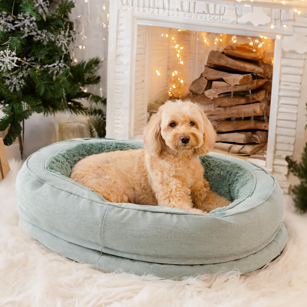 Cama ortopédica esponjosa en forma de rosquilla para perros