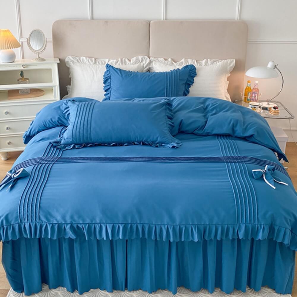 Elegante juego de sábanas de terciopelo color leche con decoración de lazo y faldón para cama