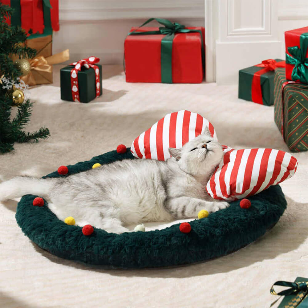 Almohada de apoyo decorativa acogedora con corona de lazo navideño para perros y gatos