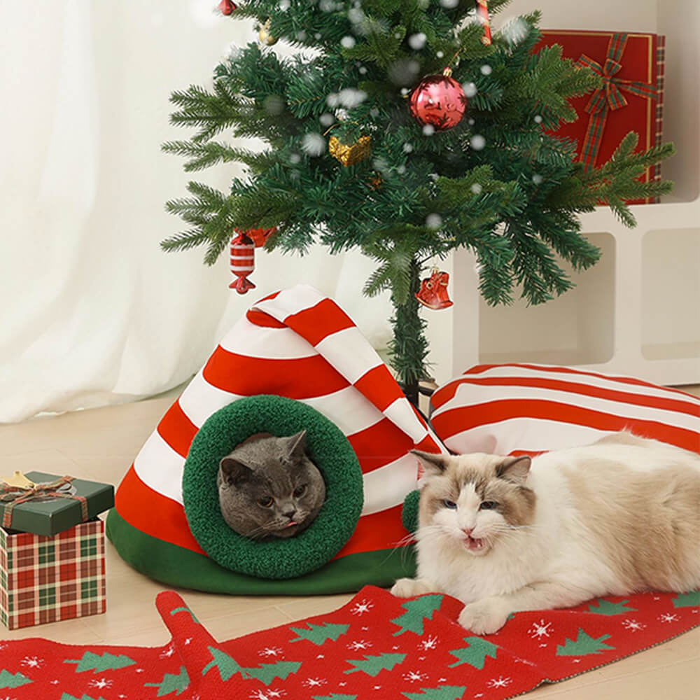 Cama cueva para gatos semicerrada, lavable y abrigada, con gorro navideño clásico