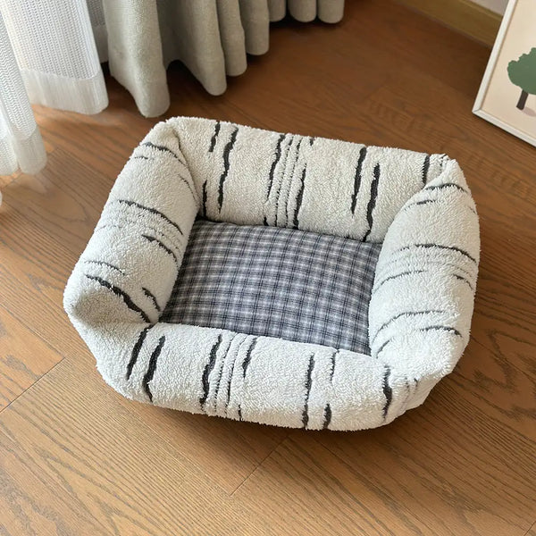 Cama de perro calmante calma de pelaje a cuadros modernos