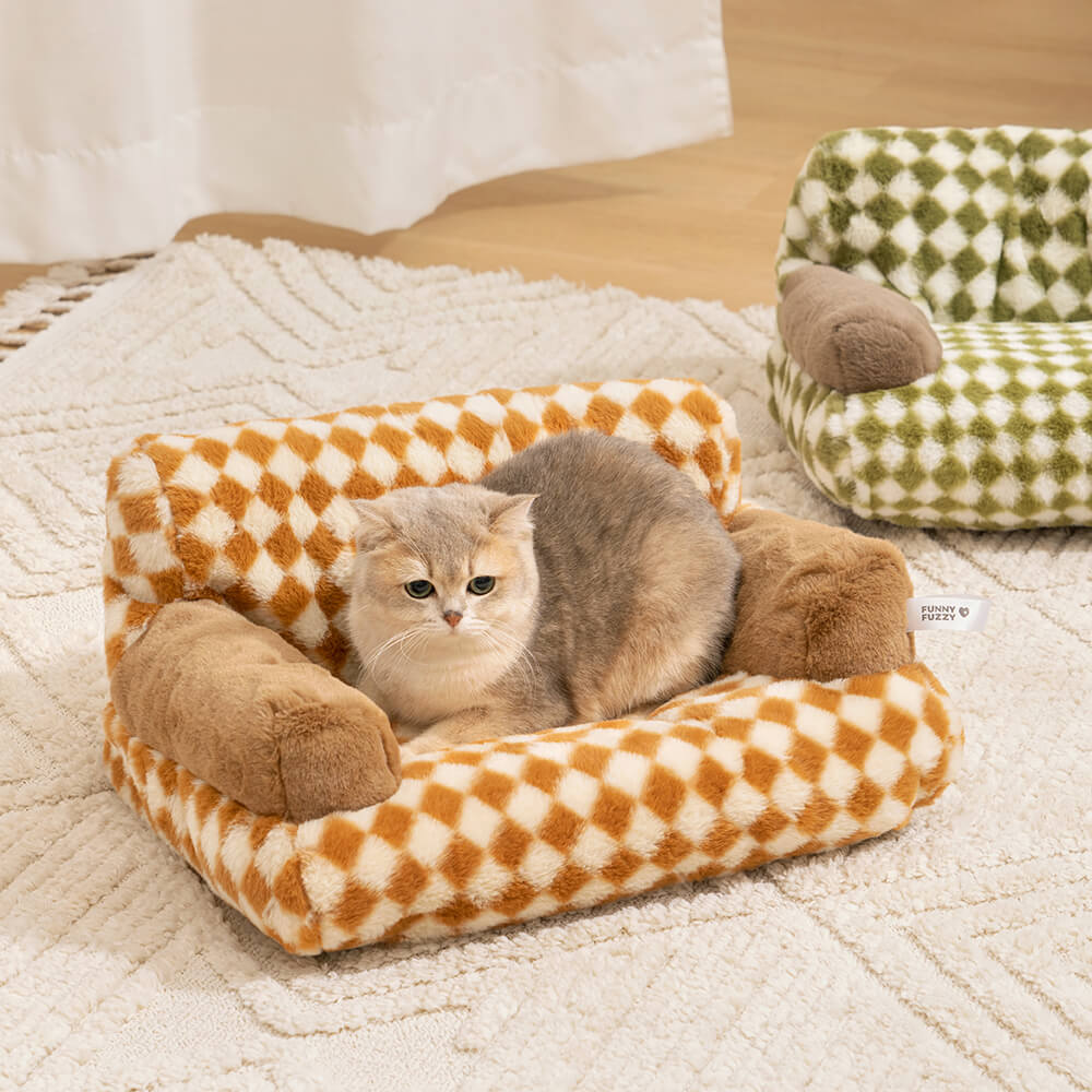 Sofá cama vintage con diseño de gato y diamantes