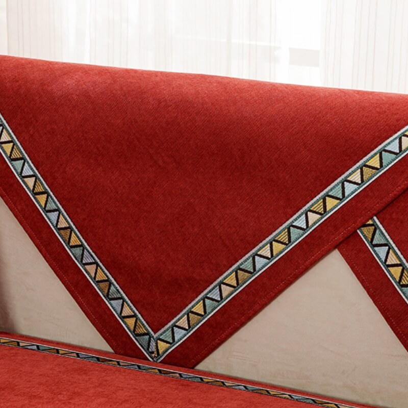 Funda de sofá cómoda antideslizante de chenilla de color sólido con decoración geométrica
