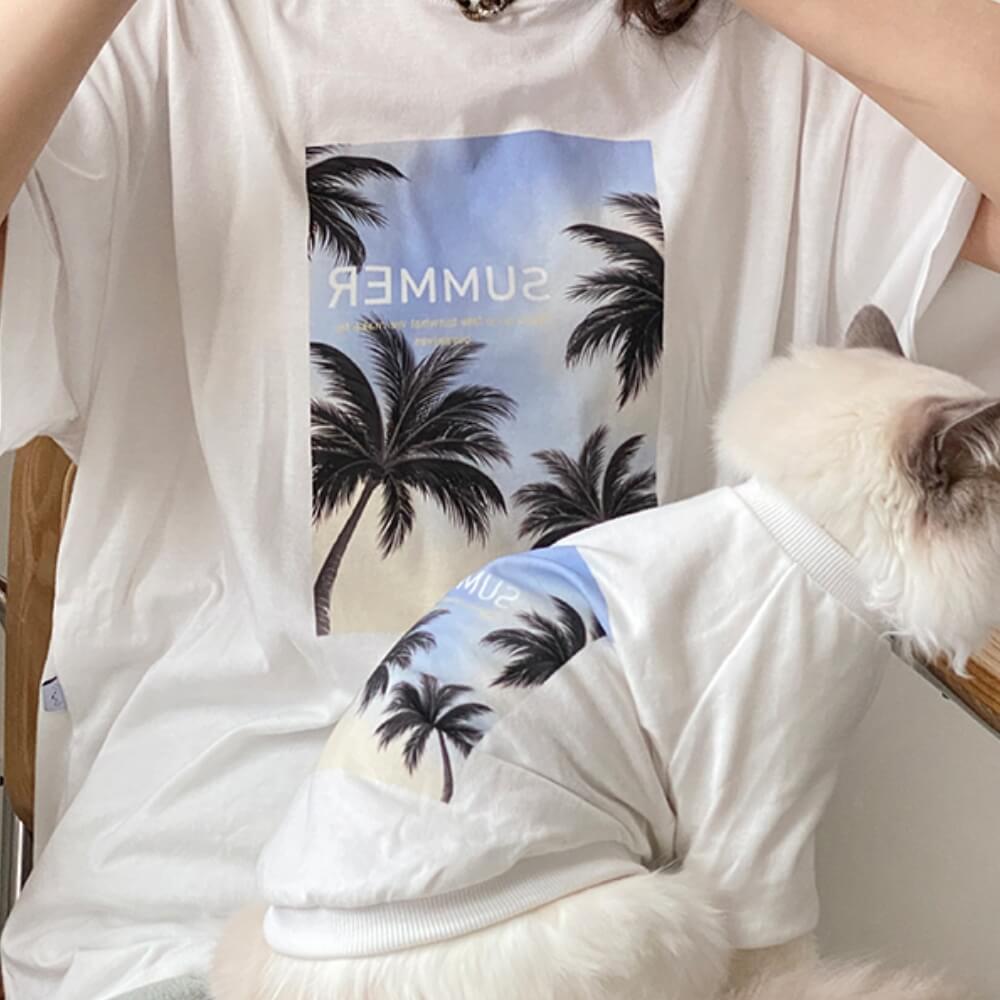 Camisetas a juego con cuello redondo y estampado de palmeras de verano para perro y dueño