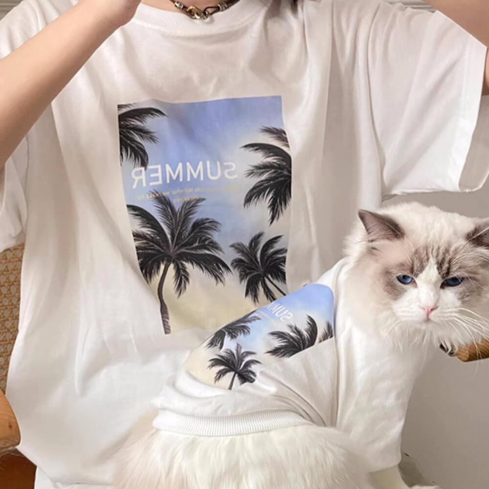 Camisetas a juego con cuello redondo y estampado de palmeras de verano para perro y dueño