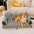 Sofá cama plegable para perros con diseño moderno, repelente al agua y con rayas - Sunny Siesta