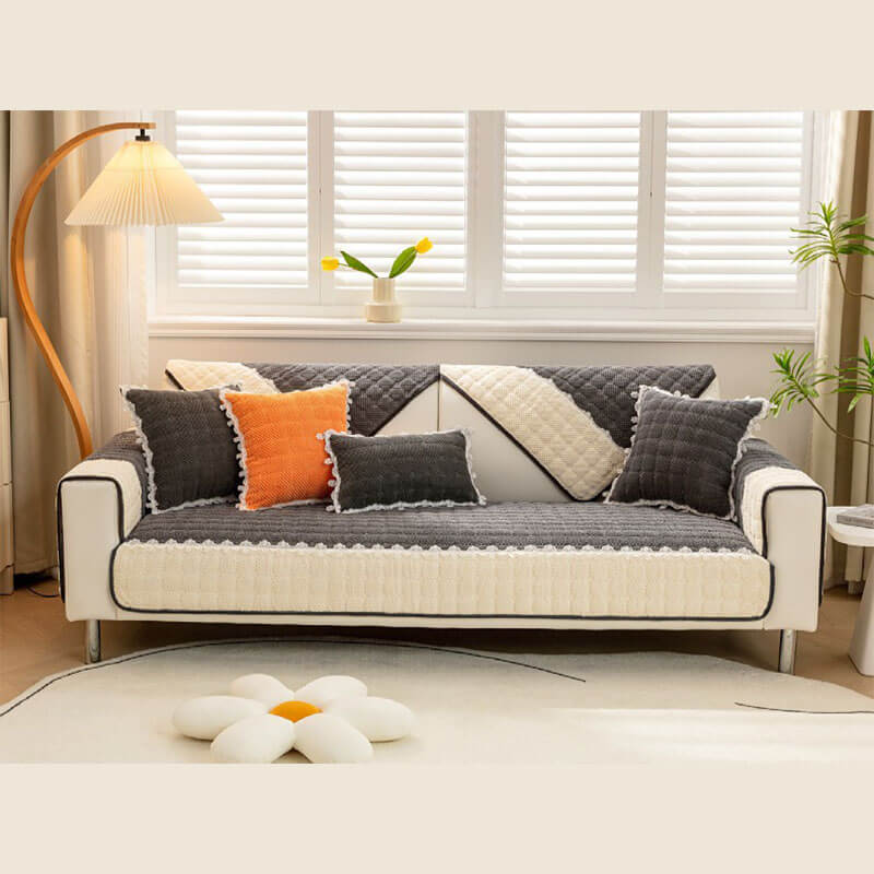 Funda de sofá antideslizante con bloques de color de pana y encaje