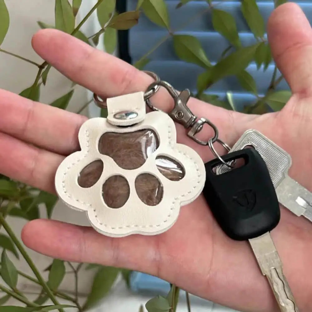 Llavero con relicario de memoria para cabello de mascota